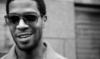 Kid Cudi. His lyrics are incredible and I'd love to tell him how much I admire him, his honestly, and his words.